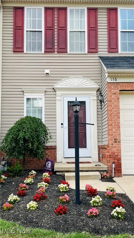 Welcome Home to this beautifully updated well maintained townhome that's located in the popular Sandstone Ridge Community. The well lit foyer with it's hardwood flooring leads you to the open concept living space where you will find a fully remodeled kitchen (Sept. 2024) with tons of cabinets for storage. From the double pantries with pull out drawers, to the extra cabinets added to the island, there's plenty of space for all your culinary needs. The gorgeous LG appliances have all been updated, and the eye catching chandelier and granite counters all compliment this welcoming space. There's plenty of seating around the large island where you will enjoy views of the backyard and deck, or you can retreat to the living room to relax. There is a half bath and access to the attached garage in the hallway. From the front door you can also head upstairs on the newer plush carpet that has been installed throughout the second level and find the lovely master bedroom with it's two closets, one that is a walk-in, as well as the master bathroom with the nice soaking tub. There are two additional bedrooms and a full size bathroom as well as a laundry area for convenience of use. Back on the main floor you can head to the basement where you will find a nice sized area for your recreation or entertaining purposes. There are also multiple closets for extra storage. This townhome is on a dead end street that offers additional parking for you and your guests. Located close to the Cleveland Metroparks, Coe Lake and many other desired amenities, this amazing property is sure to please. Call for your private tour today!