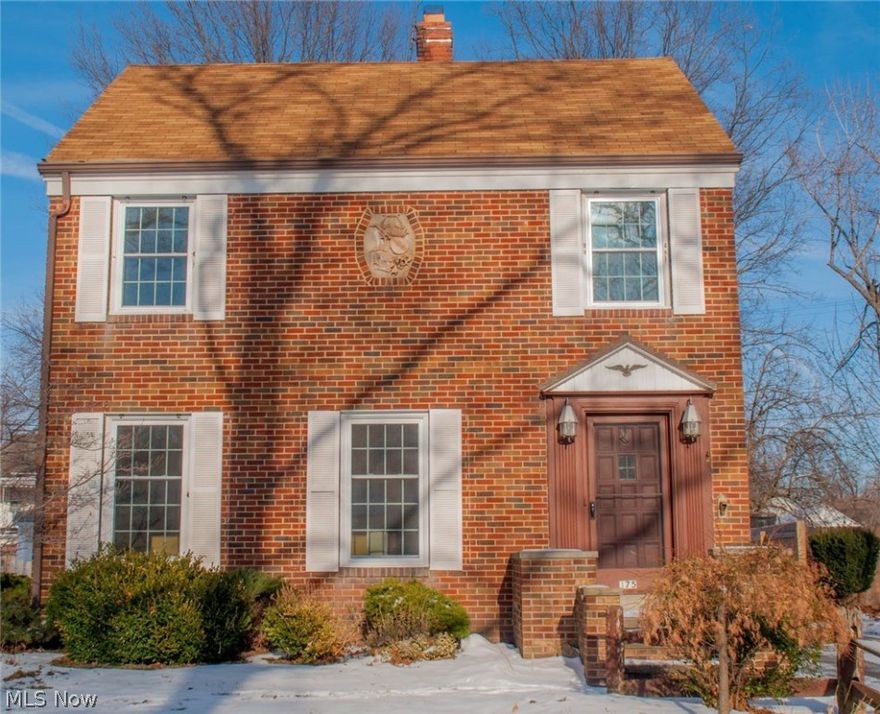 No exaggeration move-in condition is what you will find in this red brick 3 bedroom 1 & 1/2 bath adorable colonial with a private beach club.  The club offers a respite from everyday stress, soothing sunsets and summer activities for the whole family. New windows Dec 2014, entire interior including woodwork carefully painted Jan 2015.  Whole house wall to wall carpeting installed over hard wood floors Jan 2015, hot water tank Jan2015, lighting fixtures and bathroom sink unit Jan 2015. The 2 car  garage is over-sized and has a man door plus built-in shelving for additional storage. Enjoy summer evenings on the deck off the formal dining room with two built in china cabinets or on the 2nd floor bedroom deck. The finished third floor is ideal for a playroom. The neighborhood is perfect for families young and not so young who want access to shopping, churches, good restaurants, freeways and the always there - beautiful Lake Erie