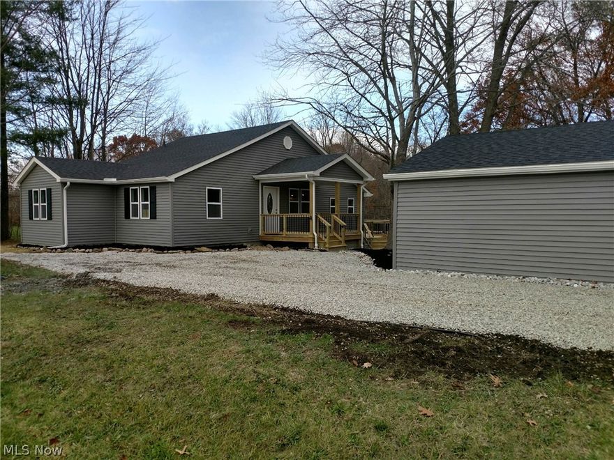 Don't blink or this completely renovated ranch will be gone!!! The property offers a sloping yard to a calming creek. Located on a corner lot close to shopping, hospital, easy access to I-90 and  everything GOTL has to offer. The home features high end finishes from the fixtures to the trim!!! Luxury vinyl/tile flooring through the main area, stainless steel appliances included, new roof, furnace, AC, water tank, doors, windows, all fresh drywall and paint!, concrete sidewalks, siding, landscape, new covered porch and rear deck. This open floor plan is very desirable from the glamour master bath/suite to the luxurious kitchen, not a corner was cut or missed on this one! Must see to appreciate so schedule with your agent today!