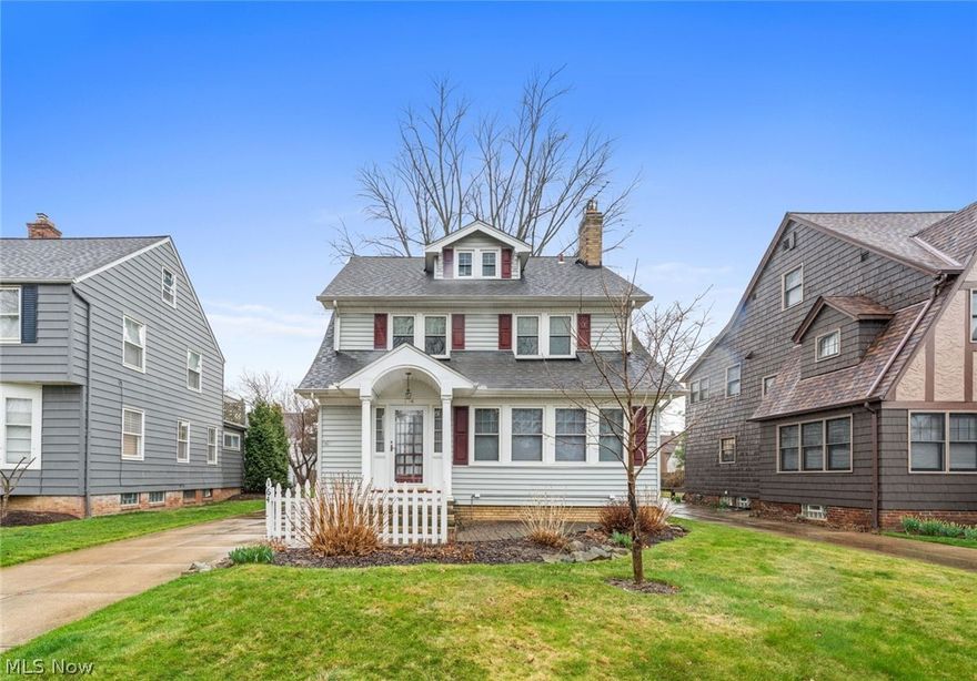 Charming 3-bedroom colonial boasting stunning original woodwork located close to Lake Erie in a beach club community with an optional membership. A warm, inviting curb appeal welcomes you, guiding you into the foyer. Inside, discover a spacious living room adorned with gleaming hardwood floors, built-in cabinets, and a wood-burning fireplace. Adjacent to it is a sunroom that offers an ideal spot to savor your morning coffee. Entertain in style in the formal dining room featuring hardwood flooring, a built-in window bench, and cabinets with beautiful leaded glass. The expansive kitchen delights with plentiful cabinets, an island, and a convenient built-in desk, all complemented by access to the rear deck; all appliances included. A half bath rounds off this level. Ascend to the second floor, where the charm continues with a generously sized owner's bedroom and two additional bedrooms flooded with natural light, one of which boasts a cozy sunroom. Completing this floor is a full bath with a vanity and tub. Discover additional living space on the third floor, showcasing decorative wood panels and built-in shelves. The lower level offers a laundry area and ample storage. Outside, host a summer gathering on the rear deck or in the partially fenced-in yard. Detached two-car garage. The home is sold as is with the buyer to assume the City of Euclid POS violations.