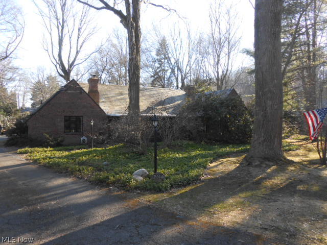 Old World Charm abounds in this unique and beautiful Kemppel built ranch. Must see to appreciate! The spacious Living room with high ceilings and gas fireplace is light and bright! Cozy formal Dining/Hearth Room has slate floors, beamed ceilings, bay window, wine closet and stone gas fireplace! Leaded glass windows and stucco walls throughout. Cheerful kitchen with pass through to fantastic family room addition that has a cathedral ceiling, loft, skylights, floor to ceiling windows, wood floors, accent brick walls and built-ins! Versatile office or 3rd bedroom with wood floors, staircase to 10 x 10 loft and private full bath/laundry room could make a great master suite or teenage hanguout! Spacious and sunny enclosed porch. Large fully fenced yard plus newer deck porch. Storage barn too! Radiant floor heat throughout plus central air and gas furnace in family room addition. Desirable neighborhood in convenient location.