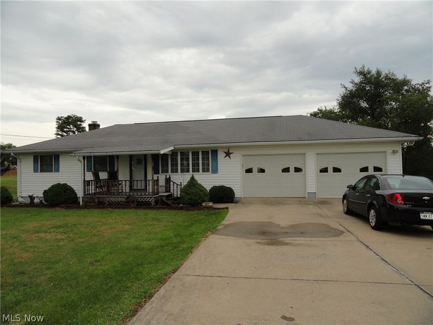 3 BR/2 BA Ranch Home features equipped kitchen/dining area, sitting room, large LR, spacious Family rm w/office space, laundry/canning kitchen combo, work out room & storage room. 2.33 Acre lot features 2 car attached garage + 4 car detached & shed, concrete driveway, back yard deck, covered front porch & wooded back yard.  New hickory floors.  Well maintained property.