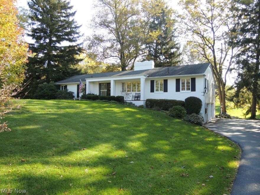 Come home to this all brick ranch which is beautifully placed in the heart of Hills & Dales Village. The finished walk-out lower level offers an in-law suite which is perfect for extended family young and old. You will find one floor living at its finest with the open floor plan, vaulted Redwood plank ceilings, walls of windows and all around graceful living. Enjoy your afternoons looking out on the park-like lot which offers complete privacy. The updated kitchen boasts hard surface counters, eat-in island, French doors into dining room and ample prep space. The clean garage has Nature Stone flooring, extra storage and newer doors. Other upgrades include: furnace/AC and newer paint.