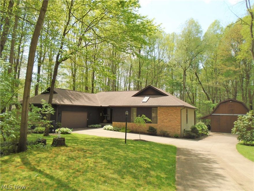 Welcome to this fabulous Ranch in the heart of Doylestown! Nearly 1800 sq ft with full, finished basement, 3 bdrms, 2.5 baths and nestled deep in a wooded and ravined lot on dead end street! Beautiful wood foyer with custom insets, step-down family room with wood-burning fireplace and slider to deck overlooking backyard. Master suite with WIC and large bathroom. Kitchen with granite island, beautiful oak cabinetry, updated appliances and bayed window. 24x30 Polebarn! Heated (propane), electric, cable, phone connections, and a 6' lean-to. Clean and meticulous perennial beds and extensive treework maintained. Call today for an appointment!