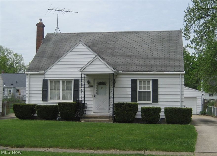 This home is a must see!  Immaculate, one owner home with replacement windows and newer doors, glass block windows, 2 full bathrooms!  There are hardwood floors throughout and there have never been pets in this home.  The home offers an oversized one car garage with lots of additional parking, a covered patio area and fenced rear yard, finished lower level. Close to parks, schools and walk to downtown events. Don't wait!  Make an appointment to see as it won't last! One year home warranty provided for buyer at closing.