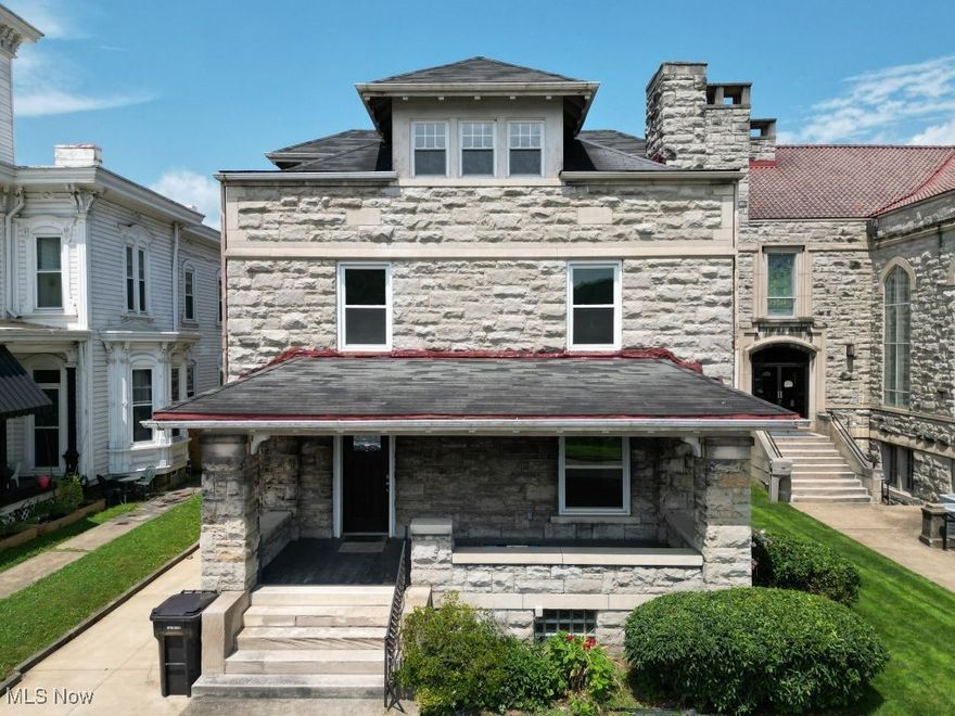 Riverside Colonial Charm Meets Modern Comfort!
Step into timeless elegance with this stunning 4-bedroom, 1-bath Century Home, beautifully perched on the scenic banks of the Ohio River. Built in 1900, this three-story Colonial-style residence offers sweeping river views and a front-row seat to the rolling hills of West Virginia—all from the comfort of your covered front porch. It is the perfect place to sip your morning coffee or unwind in the evening while boats drift by and eagles soar above. Inside, you will be captivated by the home’s rich history and character—featuring two gorgeous turn-of-the-century fireplaces, intricate original woodworking, a charming window seat, and soaring ceilings that elevate every room. The dedicated office boasts gleaming original hardwood floors, perfect for working from home in style.
This historic beauty has been thoughtfully updated for modern living. Enjoy a brand-new furnace and three energy-efficient mini splits to keep you cool in the summer. Other recent upgrades include: new paint, carpet, flooring, updated electric, stylishly remodeled kitchen and bath, plus new windows and doors throughout. The dry, full-height basement offers tons of
storage and workshop potential. Crafted with enduring materials—block, concrete, and stone—this home is as solid as it is
stately. Whether you're drawn by the water, the architecture, or the rich history, this rare riverside gem is ready to welcome you home. Don’t miss your chance to own a piece of the past with all the comforts of today!