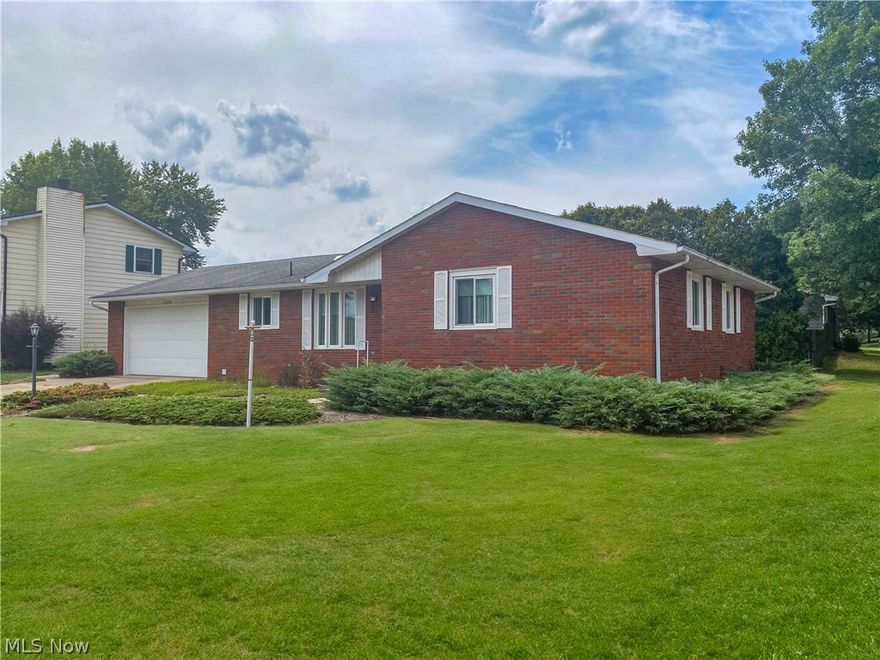 This classic brick ranch on the Southside of New Phila sits on a large corner lot featuring a quiet and private back yard with a fully screened 14'x17' porch and an adjoining 7'x13' storage shed. Inside you will find the ease and convenience of one floor living with new windows throughout and a laundry closet with washer & dryer included in the kitchen. Downstairs has so much potential with a 15'x16' bedroom and a large unfinished space including a sink and toilet. The basement has two means of egress with cement stairwell that leads to the attached garage. Schedule a tour today!