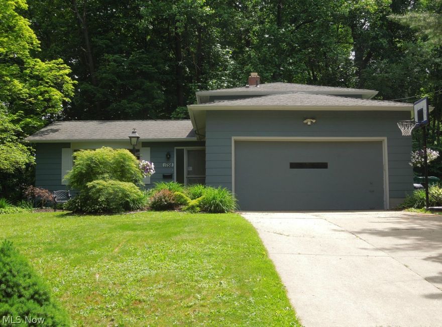 This is definitely not a drive-by property--it's a MUST SEE!  This split level home offers an updated spacious floor plan perfect for entertaining or just enjoying the comforts of home.  The living room boasts beautiful refinished wood floors (2013) and a bay window to add extra light.  If you are looking for a kitchen that has been completely renovated (2010)--look no further, new cabinets, lighting, newer dishwasher 2013, microwave/range hood 2010, ceramic tile, backsplash, sink, base molding, registers, a breakfast bar to add extra seating and new countertops! The family room adds extra living space with a sliding door leading to a concrete patio perfect for BBQing or enjoying a beverage on a starry night! The family room also has newer carpet (2008), newer paint/lighting (2012) and wiring for surround sound (2011)! Not only does this home have 3 bedrooms but the owner has added what could be a 4th bedroom or an office on the lower level AND A FULL BATHROOM (2008)!!  The partial bas