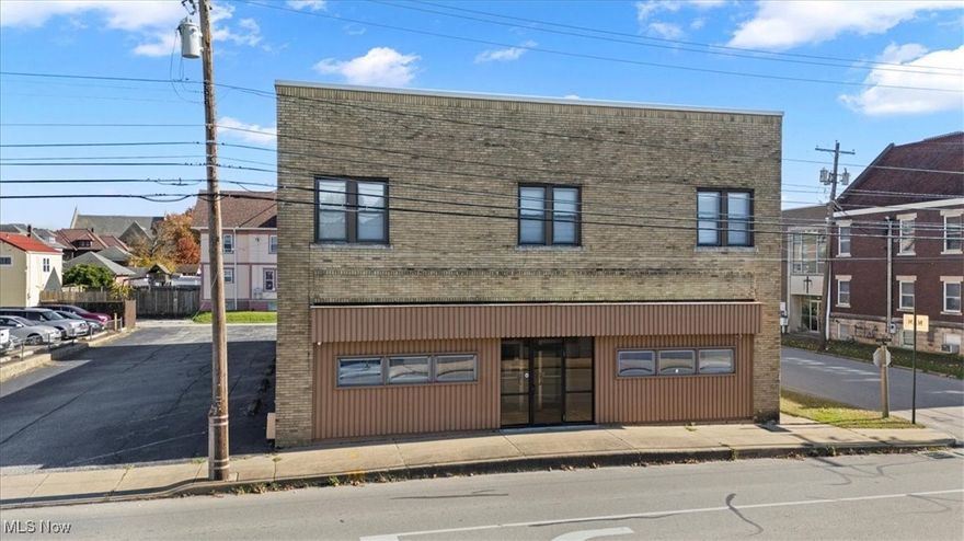 Discover the potential of 2000 Dudley Avenue in Parkersburg, WV, a versatile 6,200 SF mixed-use building now on the market for sale or lease. Conveniently located across from Parkersburg High School, this property benefits from a daily vehicle traffic count of 9,500. The upper level features two fully rented 1,300 square foot apartments, each with two bedrooms and one bathroom, generating $750 in monthly rent each. On the ground floor, you'll find two 1,100 SF retail or office spaces, previously occupied by a local dentist, now available for lease and adaptable to suit your business requirements. Whether you're interested in acquiring an income producing property with growth potential or seeking a high-visibility location for your new business, this building is an excellent choice. Contact me today to schedule a tour.