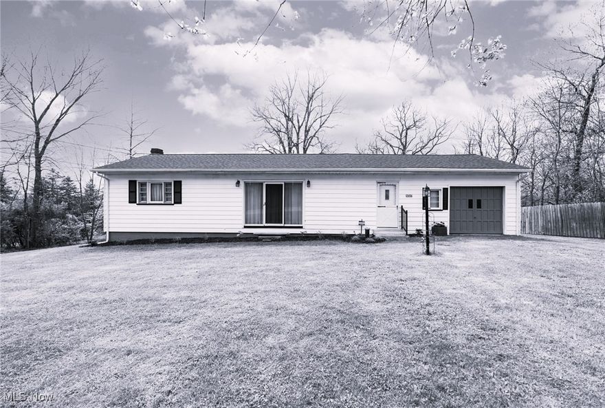 Welcome to this charming ranch home located in Springfield Local School District. This delightful property features an attached one car garage and has a roof and furnace that are only about 5 years old, ensuring peace of mind for years to come. Step outside to enjoy the spacious deck at the rear of the house, perfect for relaxing or entertaining guests. The home is situated on a private one acre lot, offering beautiful views and a serene atmosphere. Call today to secure your little piece of paradise!