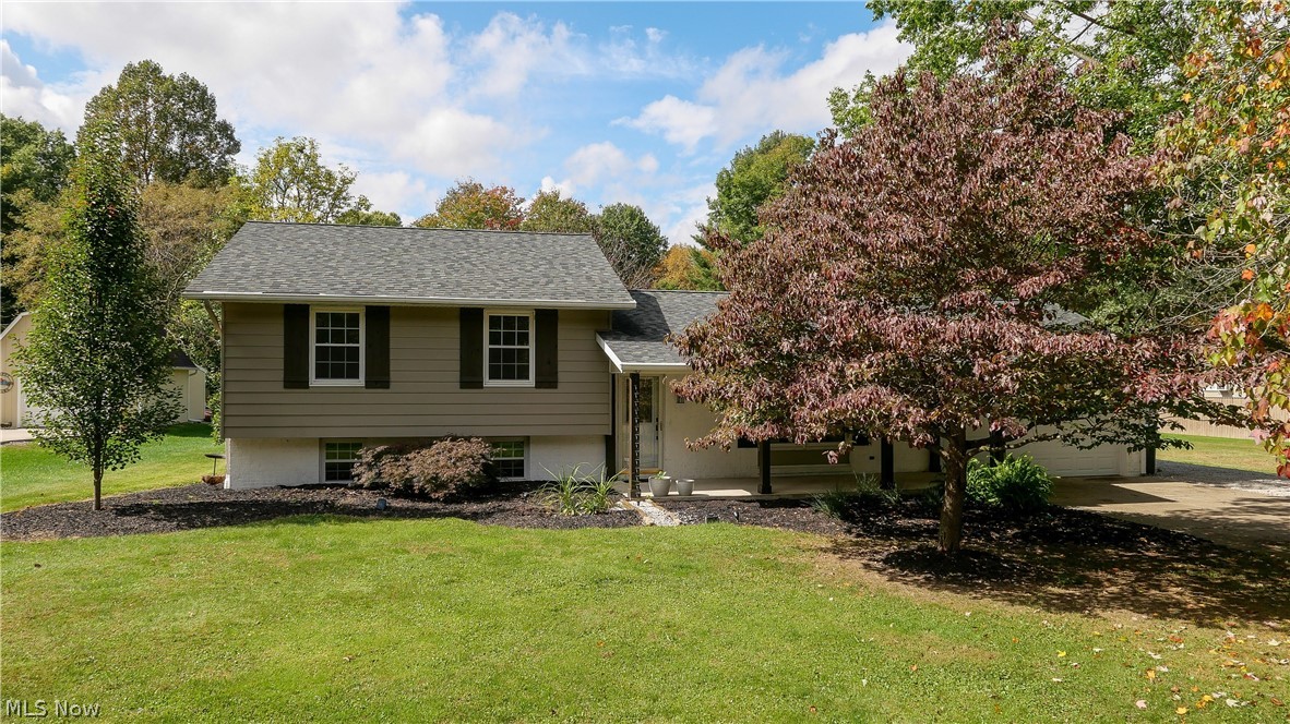 This gorgeous, updated home has so much to offer, including the perfect location! Located in a beautiful, quiet neighborhood in Lexington Township but only minutes from shopping, restaurants, and the highway. The open concept main floor features brand new laminate flooring. The updated kitchen has granite countertops and plenty of cabinet space, including a kitchen island with bar seating. 3 bedrooms and the main bath are located on the top floor, with newer laminate flooring throughout. The lower level of the home features a family room and a bonus area that has the possibility of a fourth bedroom. This home also offers a whole house filtration system by Kinetico. There is a 2-car attached garage with a new utility tub. The additional detached 2-car garage would be perfect for extra storage or a workshop, the possibilities are endless! Don’t miss the chance to own this amazing, move in ready home!