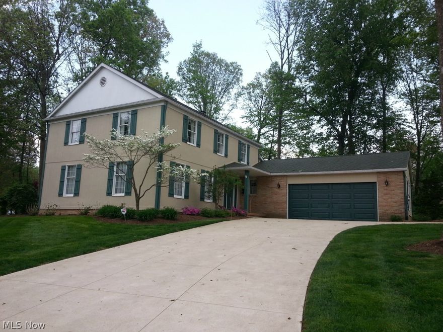 Beautiful well maintained home. Updates include: entire exterior paint, some interior paint (most wallpaper stripped and wall painted neutral) & some new carpet in 2015. Roof (35 yr. shingle), nature stone front porch & garage floor, garage door, driveway, HWT, garbage disposal, microwave oven, & landscaping all within the last 8 yrs. Furnace & air new in 2002. Cozy screened in porch overlooks wooded setting.