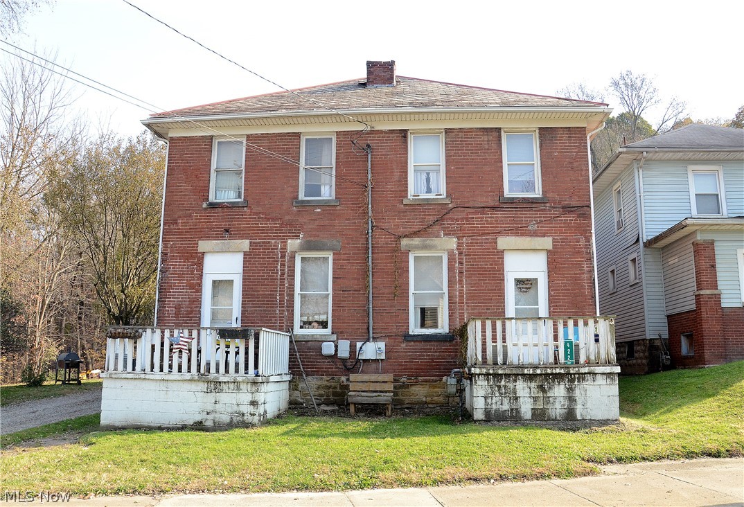 Low maintenance brick townhouse. 2 units. 3 BR, 1 bath each unit. Renters pay utilities.
