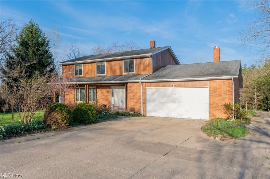 This beautiful countryside Colonial brick home is situated on a 1.5-acre lot at 3714 Huffman Road, and boasts over 4,000 square feet of living space. The estate features five bedrooms and 3.5 bathrooms, along with a living room, family room, and a large sunroom. The finished portion of the basement has two large recreational rooms & a full bathroom, while the unfinished portion offers a large storage area, and a large workshop area that is walkout accessible. The home is heated with baseboard zone heating and also features A/C. The utilities include gas, electric, county water, and septic, with a cistern available for watering. The roof was replaced in 2012, and the upstairs windows were updated as well. The upstairs bathrooms were also updated in 2012. Please note that the property is being sold "as-is." Serious buyers are welcome to schedule a tour with a pre-approval letter.