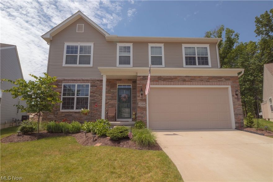 This newer colonial home is located on a prime lot cul-de-sac in the desirable Edgebrook community in Strongsville. This is your opportunity to own a newer home without having to wait! Built In 2015 this well appointed home has many features that make it functional for today's living! Spacious floor plan boasts 9 foot ceilings throughout!  This home has a beautiful eat-in kitchen, perfect for family entertaining!  Enjoy a cup of coffee in the sun room that is the highlight of the house overlooking the wooded backyard.  Large family room includes a gas fireplace with a stunning stone facade.  This home also features a welcoming covered porch.  Great location close to shopping, schools, restaurants, recreation, highways and the turnpike. This communities HOA includes lawn care, snow removal and landscaping for ease of living. Home warranty included for added peace of mind.  Call today to schedule your private showing before it's gone!