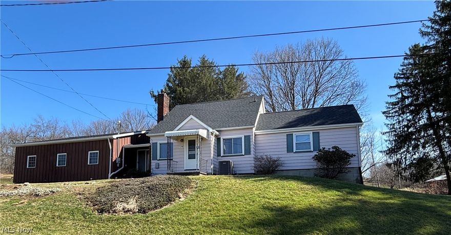 Don't miss the opportunity to own this three-bedroom home with 25 acres and a stocked pond with catfish, bass, sunfish and frogs! The scenic backyard features a large barn with water and electric. Behind the barn you will find a three-sided building which can be used for family reunions and picnics. There is also a small shed behind this building. Additional block garage is 220 amp and was used for welding shop with air compressor. Electric runs underground from main garage. This building can be used as a one car garage or for lawn tractors and gardening supplies. The attached garage has two overhead doors but can fit three vehicles. It has built-in cabinets, work benches, heat and water. Attached to the back porch is a fenced in kennel for your pets!

As you enter the home from the garage, you step into a mud room that can also be used as pantry storage. The primary bedroom is on the main level with a newly renovated bathroom with walk in shower and large closet. The family room, dining room, and kitchen are also on the main level. Upstairs are two bedrooms with natural wood flooring and a half bath. In the basement, you will find the washer, dryer, utility sink and shower. Kinetico water softener (serviced by Gordon Bros) with updated reverse osmosis system (2021). Heat pump and air conditioning is new (2020). New roof on house garage and block garage 2025. Leaf filter on gutters also new in 2025. Lastly, the basement has a separate one car pull in garage where you can store lawn mowers or an additional vehicle. Schedule your showing ASAP!