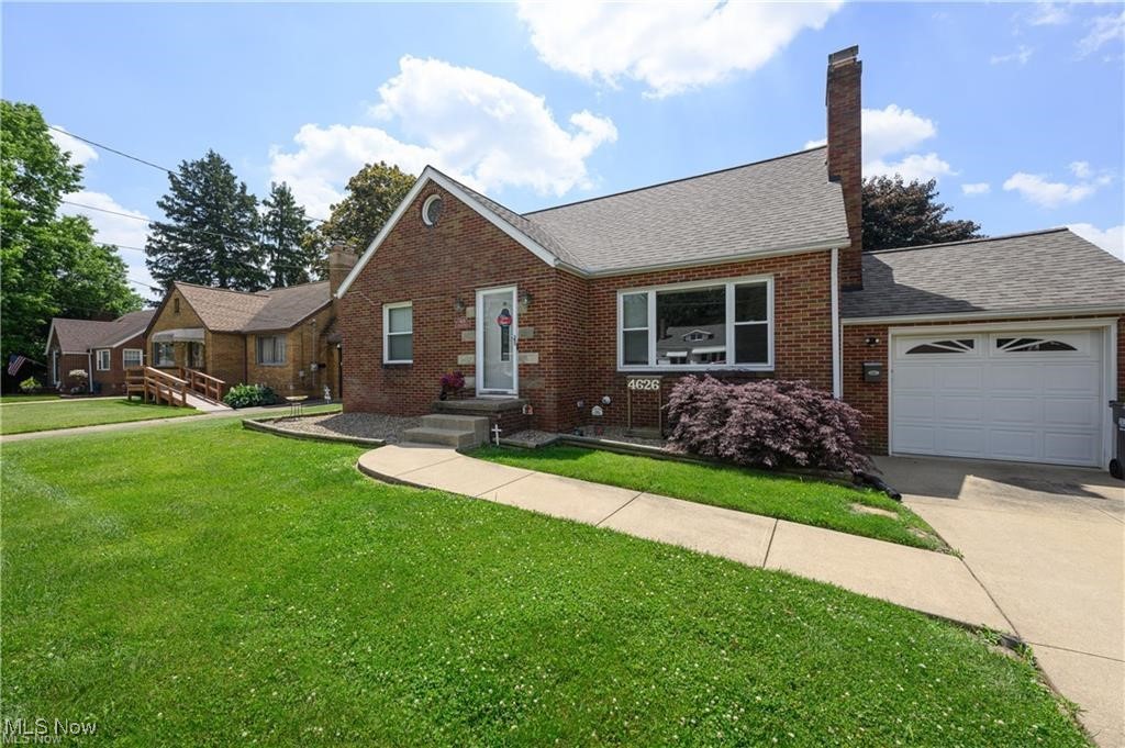 Find a place to call home before school starts! Welcome home to this charming 3 bedroom, 2 bath bungalow in the desirable Perry School District! This delightful home offers the perfect blend of classic character and modern updates throughout. Beautiful curb appeal draws you inside to discover a warm, inviting living space. The kitchen has been renovated within the last 10 years to incorporate modern touches, complete with granite countertops and stainless appliances. Two main floor bedrooms and a full bath for easy living. Upstairs is the third bedroom with an abundance of storage space. Original wood floors throughout the main floor enhance the beauty this home holds. The partially finished basement offers additional space for recreation or storage, along with an updated full bathroom and nature stone flooring. Outside, you'll love the spacious deck, ideal for entertaining or relaxing, overlooking a private, fenced-in backyard with plenty of room to play. With a convenient 1-car garage, this bungalow truly has it all! Updates include: roof 2021, hot water tank 2020, windows 10 yrs, fence 2020, paint, flooring, and more. Immediate possession at closing. Call today for a private showing!