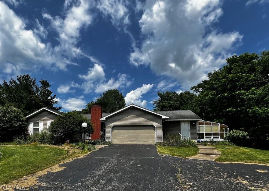 A little TLC will bring this charming 3 bedroom ranch home back to its days of glory. Features include a living room with wood burning fireplace, kitchen with adjoining dining space, 3 generous bedrooms, 1.5 baths on the main floor, separate family room, and the added bonus of a large sunroom / potential green house. The full basement has an additional full bath, large laundry room, the potential for additional living area, and abundant storage space. Situated on a spacious lot, there's plenty of room for gardening, play, or simply soaking in the beauty of nature. Call today to schedule a showing!