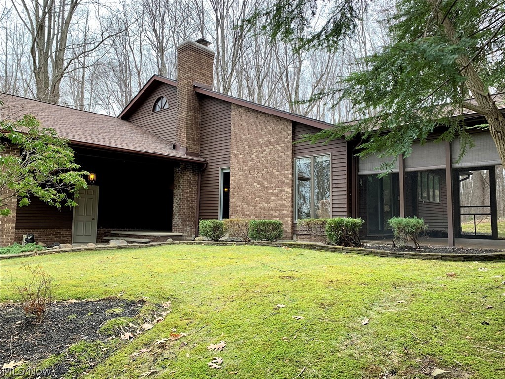 Welcome home to this move-in ready, meticulously maintained ranch home located on a private wooded lot in Concord Twp. This home features 3 bedrooms, 2 full bathrooms, along with an attached 2 car garage. Upon entering, you will immediately notice the vaulted ceilings throughout the dining room and family room. The family room features a stunning wood burning fireplace, large windows, and a sliding glass door that leads to a private screened in patio, providing plenty of natural light. Adjacent to the family room is a spacious dining room and freshly painted kitchen with granite countertops. Just off the laundry room you can access the backyard with a generously sized deck and shed. The spacious master bedroom offers a large walk in closet and a private bath with sauna, perfect place to unwind from a long day. An additional 2 bedrooms and updated full bath complete this beautiful home. Recent improvements include: 3-D shingle roof (2020), hot water tank (2020), electrical panels (2020