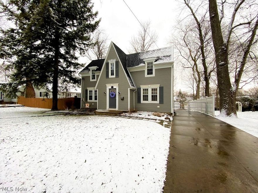 Welcome to this stunning home, a proud recipient of 2020 Akron Beautification Award. This seller updated every detail of this home, yet it kept the original French doors and its true character. You will love the choice of colors and accent pieces, as this home truly has a perfect flow. The most stunning is the family room with built in glass cabinet and, featuring under mount lighting, new flooring and plenty of natural light. This family room overlooks a very spacious and fully fenced in backyard. Each section of this home features gorgeous glass French doors. Another beautiful feature is the original chair rail in the Formal Dining Rom, as well along the staircase and the upper level spacious hallway. You will love the size of 3 bedrooms as well as beautiful decorated bathroom. Living room features built in book shelves, French doors, fireplace with white trim and hardwood floors. You will love the size of the kitchen with a coffee nook, and a convenient office nook. Some of the majo