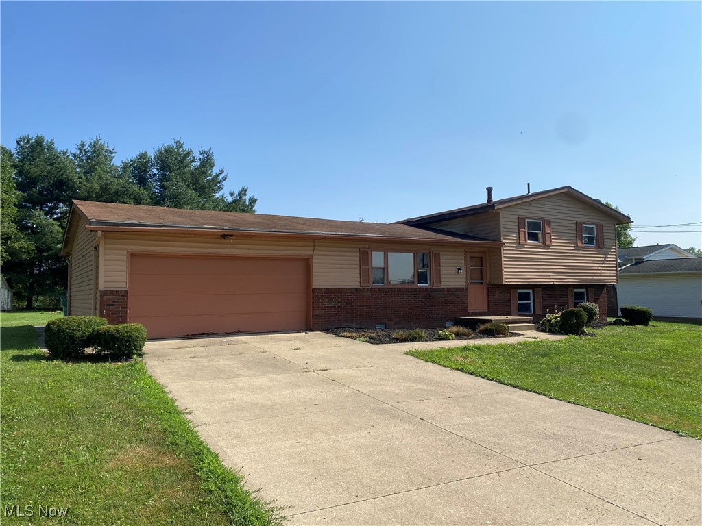 Three Bedroom, one bath home in Lake Township. Lake Local Schools. Here is an oppurtunity for you to add a little TLC to a great home! This home combines convenience with a peaceful, country setting. Enjoy the spacious deck overlooking your own private yard. Inside, the split-level layout offers 3 bedrooms and 1 full bathroom, along with finished lower-level rec room perfect for extra living space, a home office, or entertaining. The seller is installing a new septic and roof once an offer has been accepted.