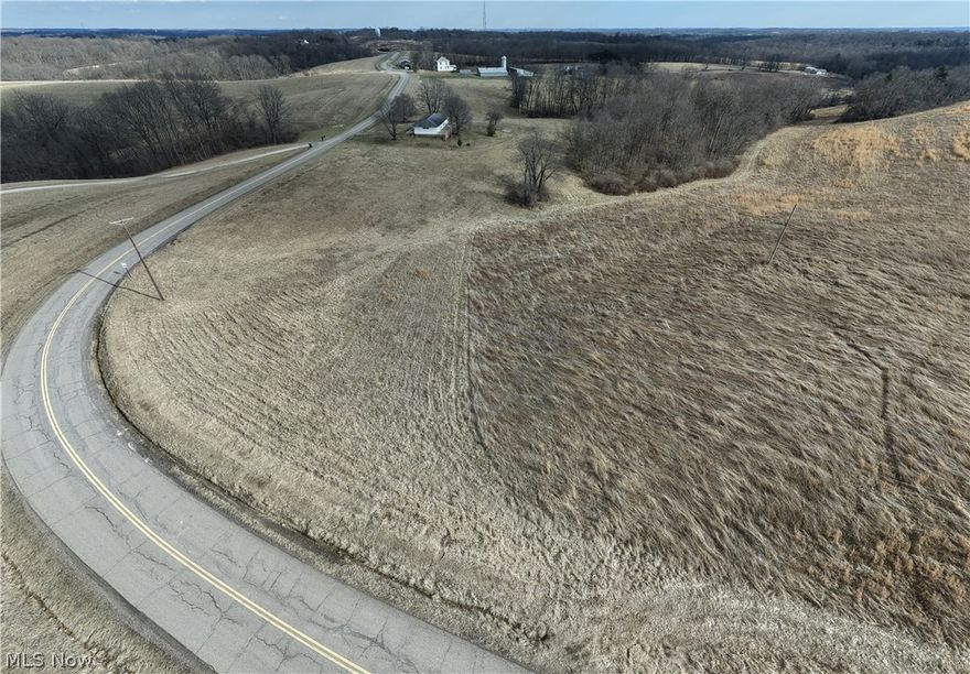 Online Auction begins ending Saturday, April 11th, at 11:00 AM. Parcel 4: 15.5 Acres Open and Wooded. 640’ Frontage on Pinecrest Drive. The open acreage consists of a mix of hay fields and pasture, complete with a spring-fed water trough and a pond. The wooded acreage features an assortment of young and maturing hardwoods and is highlighted by rolling terrain, ravines, natural pinch points, and a creek running through the property—ideal for recreation, wildlife habitat, or long-term timber potential. Overall, the land offers an excellent balance of open and wooded ground with gently rolling topography throughout. Conveniently located with easy access to I-70, the property provides a straightforward commute to Columbus or Cambridge while maintaining a true country setting.