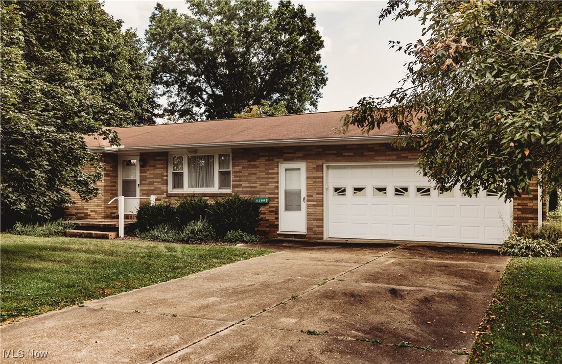 This ranch is located within Ridgewood School District and is situated on a level lot. The home offers an eat in kitchen and off of it, an enclosed porch area currently home to a hot tub. The three bedrooms and one full bathroom are also on the main level. The basement offers a second full bathroom and partially finished space with a family room and kitchenette area. The property also includes a detached building at the rear of the lot, perfect for a workshop or extra storage. Updates include a new electrical panel.