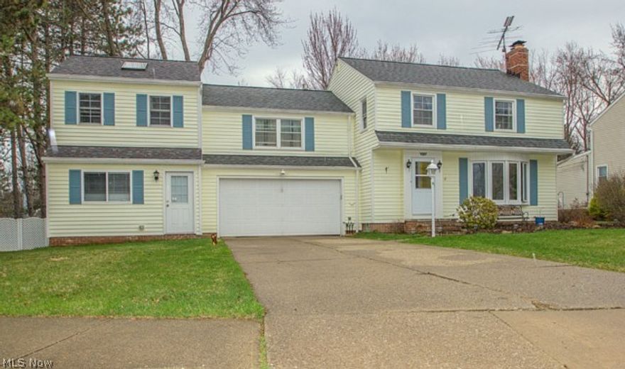 Unique home on cul de sac overlooking a beautiful setting at park and school. Great space with nice size rooms, this home is perfect for someone who wants to run a home business since it has a 2003 addition with a separate entrance! Ceramic tile in LR has heated floors with wood burning fireplace. Year round main floor sun room also has heated floors. Remodeled Kitchen in 2001 w/ Kraftmaid cherry cabinets & black appliances. 4 bedrooms, master bedroom has HW floors, gas FP, 2 closets and it's own master bath. Deck off 2nd floor office w/vaulted ceilings & skylights. Main floor bonus room can be another Rec room/FR or workout area. Newer tear off roof, whole house generator, 2 tiered deck w/hot tub, waterproofed basement & blown in insulation.  2 car attached garage w/nature stone. Zoned heat & AC, great location close to it all! This house offers so much bang for the buck!