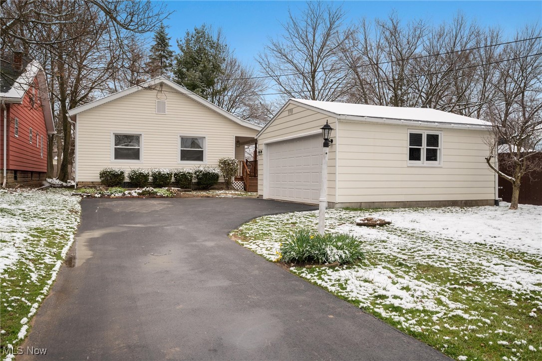 Completely remodeled between 2023 and 2024, this beautifully updated 3-bedroom, 1.5-bath residence offers 1,232 square feet of refined, modern living in the highly desirable 44512 zip code, within the Boardman School District. The spacious master suite features soaring 9-foot ceilings, private access to the full bath, and a walk-out balcony—perfect for enjoying morning coffee or unwinding in the evening. The gourmet kitchen showcases brand-new cabinetry, butcher block countertops, and a striking marble backsplash, all flowing seamlessly into bright, open living areas with new flooring throughout. Significant upgrades include a new roof, siding, hot water tank, high-efficiency furnace, and central air system. The home has been fully insulated to maximize comfort and minimize utility costs. Outdoors, enjoy a fully fenced yard ideal for pets, recreation, or entertaining, along with an asphalt driveway and a two-car garage. This move-in-ready property is ideal for anyone seeking a stylish, low-maintenance home with exceptional value. Investors will appreciate its strong earning potential—long-term rentals can generate $1,500+ per month, while short-term platforms like Airbnb or Furnished Finder offer even greater returns. With its sleek upgrades, prime location, and versatile appeal, this home is a standout opportunity not to be missed.