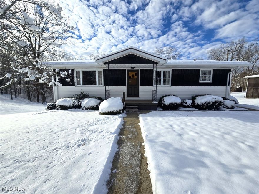 Charming Ranch on a Double Lot with endless potential! Welcome to this meticulously maintained ranch home nestled on a quiet dead-end street, offering privacy, space, and opportunity. Situated on a double lot totaling .84 acres (two parcels), this property provides room to expand, garden, or simply enjoy the peaceful surroundings. The home features a full walk-out basement, ideal for future living space, a home gym, or recreation area, plus a workshop area perfect for hobbyists or DIY enthusiasts. A side-load garage enhances curb appeal and functionality. Inside, the home has been lovingly cared for and is ready for your personal updates. Oak hardwood floors lie beneath the carpet, waiting to be revealed to their original beauty. The solid layout and classic ranch design offer easy one-level living. Located in a quiet, established neighborhood, this property is perfect for buyers seeking space, privacy, and the chance to customize a home to their taste. Call for your private showing today!