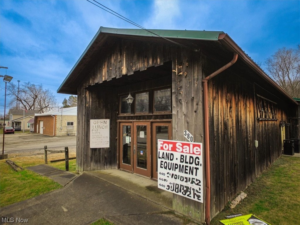 Do you want to own a piece of Ashtabula County history? Formerly Covered bridge pizza and the bridge is a true covered bridge that was moved from Forman Road. This property has been a one family owned restaurant. Beautiful dining area, public restrooms, walk in coolers, full basement for tons of storage and fully functional kitchen with pizza oven. Newer metal roof and furnace only 4 years old. Perfect location close to Pymatuning Lake for all the locals and seasonal visitors.