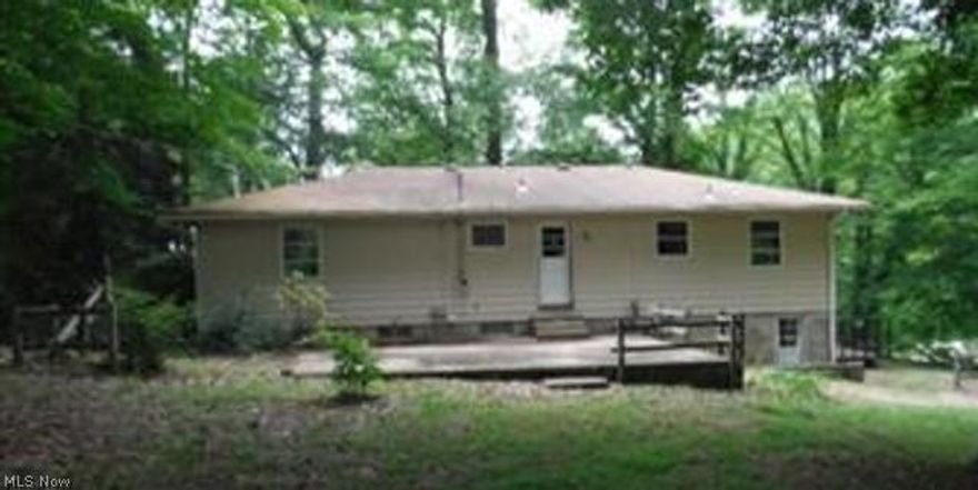 Great opportunity on this raised ranch style home in need of tlc, located just north of Zanesville on a cul-de-sac in Falls Twp. and situated on a .51 acre lot with mature trees and patio area in very nice back yard.  The interior offers 1416 sq. ft. on the main level with 3 bedrooms with hardwood flooring, 2 bathrooms, kitchen and dining room, large living room with lots of natural light, plus there is a full basement with a 2 car garage.