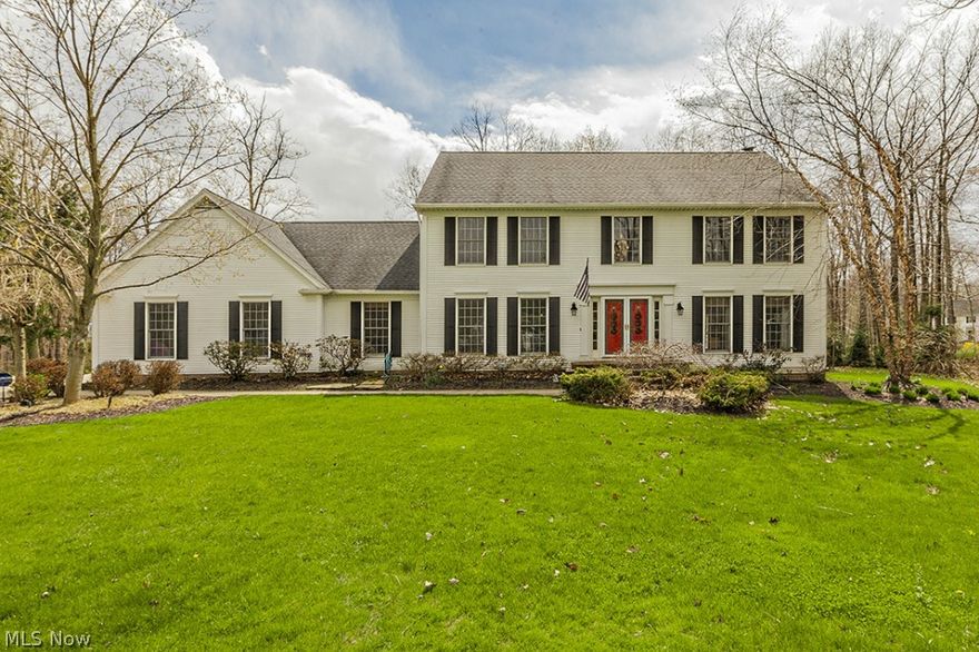 Classic Center Hall Colonial on lovely cul-de-sac lot- Stunning kitchen with all the best updates open & airy- Formal Living room & dining room- A large very pretty with walls of windows sun room, family room off kitchen has a handcrafted fireplace- There is a nice office on first floor with a great laundry area.  As you enter into Two story foyer the winding staircase take you to a spacious Master bedroom with an elegant bath with granite and wonderful layout- 3 other very ample bedrooms. The lower level all finished with full bath- playrooms- exercise space and bedroom - Meticulously maintained - turn key. Wonderful neighborhood with cul-de-sacs and open space for many sports practices and activities--Three minutes to downtown chagrin falls