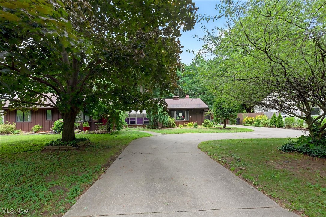 Welcome to this well loved and beautifully maintained sprawling ranch in the heart of Madison! Featuring 3 bedrooms, 2 full baths, and two spacious living rooms, this home offers the perfect blend of comfort and functionality. Enjoy hosting family and friends in the large enclosed porch overlooking a private, tree lined backyard, ideal for relaxing or entertaining. The property also includes a 2 car attached garage plus an additional detached 1 car garage, perfect for hobbyists, storage, or extra toys. Recent updates include newer central air, hot water tank, and there’s even a cozy little greenhouse/atrium for the plant lovers. Located just minutes from Lake Erie, this home is filled with charm, space, and possibilities, ready for its next chapter! Home will be sold AS-IS.