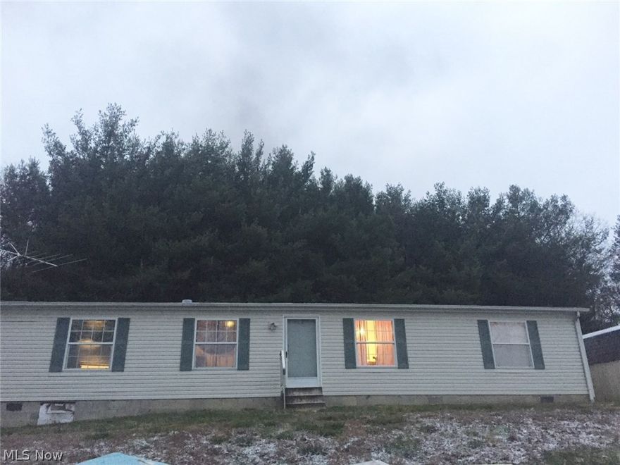 31.42 acres with approximately 2 acres of tillable land plus wooded acreage with 2 tree stands for hunting (frontage on Mt Perry Rd AKA  County Rd 55 & Coopermill Rd), multiple sheds, a 3 bedroom, 2 bath modular style home-the refrigerator, range, washer, dryer remain with the property. The master suite features a soaking tub.  The property is being sold as part of an estate.  The property is being sold as is, where is. This is an exceptional opportunity for an investor or owner occupant. Pre-approved buyers only! SEE PLAT MAP ATTACHED