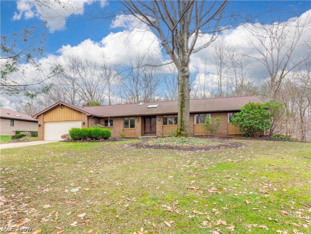 This home has so much potential! This brick ranch home is situated on over an acre with beautiful ravine views. It has hard wood floors waiting to be refinished. Screened in back porch. It needs updating and TLC. Plenty of space to make your visions a reality. The seller is asking for cash offers only. The basement needs structural work.