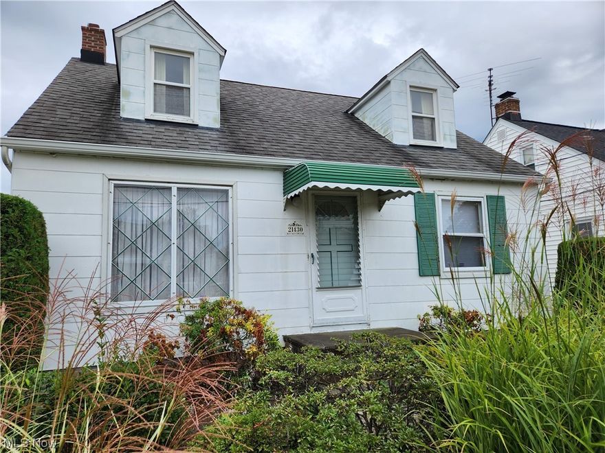 Welcome to 21340 Naumann Ave in Euclid, The Lakefront City. This 3 bedroom, 1 bath bungalow has hardwood floors through the living room and both downstairs bedrooms. The upstairs is a huge master bedroom with a walk in closet and 2 other built in storage spaces. Half of the basement is finished and would make a great playroom for kids, media room, home office, or craft area. The other half is a large laundry area and storage. Outside there is an oversized 1.5 car garage that has an attached covered patio that is perfect for quiet evenings. Recent updates include: water heater 2022, garage roof 2023, AC 2015, electric panel, rebuilt chimney 2015, roof gutters and leaf guard, range hood and dishwasher 2023, foundation dug up and waterproofed. Come make this house your new home!