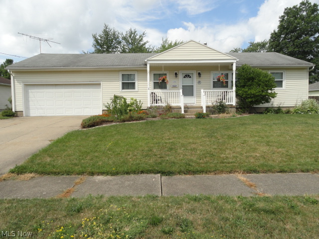 Don't miss this charming ranch in excellent condition! The open floor creates a spacious design. The updated kitchen is light, bright and cheerful with newer appliances, plenty of cabinets and an island breakfast bar. Neutral carpet and updated bathroom too. The full basement is plumbed for a 2nd bath and framed and wired to finish a rec room. Enjoy the covered porch in front or patio in back overlooking large, flat, sunny, fenced backyard!