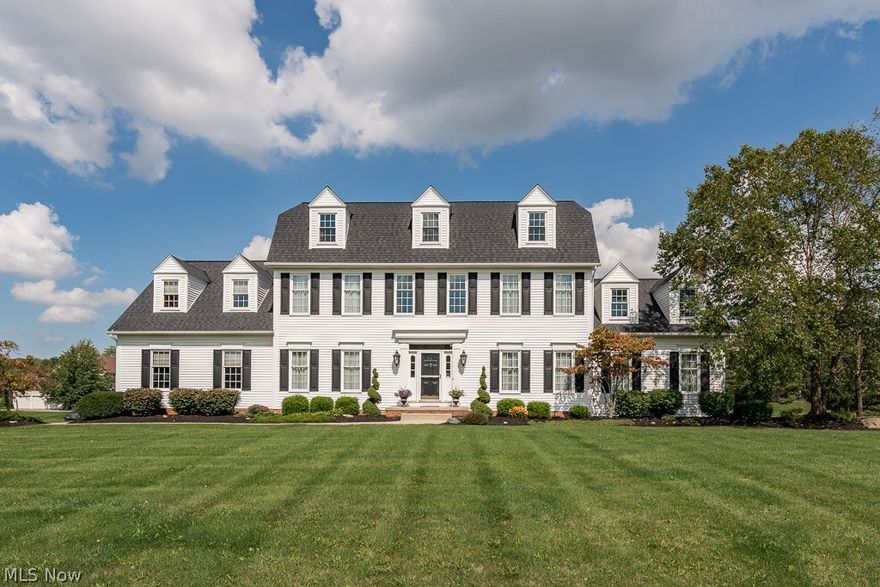 Beautiful well cared for and updated Colonial located in North Hudson, 3495 sq ft, 4 bedrooms, 3.5 baths, 3 car garage, fin. LL, on acre lot. Gracious two-story hrdwd foyer opens to the formal Dining Room and Formal Living Room with double doors, makes a wonderful private first floor office. Spacious Kitchen boasts hrdwd floors and top of the line stainless steel appliances, including double convection ovens, large center island, large pantry and new French Doors that open to the wood deck and private backyard. Vaulted Family room w/ handsome fireplace leads to the light and bright Sunroom w/ hrdwd flrs, grand palladium windows, and French door that leads to deck. Lovely updated powder room w/ mahogany cabinetry and granite counter and a large laundry complete the 1st floor of this special home. Cathedral Master Suite w/ updated tiled Master Bath, large soaking tub, rubbled oil bronzed fixtures, and spa-like tiled shower. Three more bdrms and two more full baths; one bedroom includes a