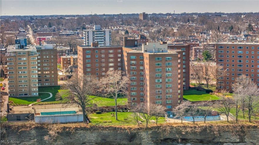 Be the next to call this end unit Berkshire condo home! Spacious floorpan offers plenty of space, along with eat-in kitchen, large dining room as well as 2 bedrooms and 2 bathrooms.  This end unit offers both Lake and City views and includes one deeded garage parking space (space #53)as well as separate storage area, a large inground pool along with a rooftop deck! Your backyard has a view of a beautiful grassy courtyard and lake Erie! Its great Gold coast living walking distance or a short ride to grocery, coffee and every you need! With some TLC and and updating you'll be ready to go! Make your appointment today!