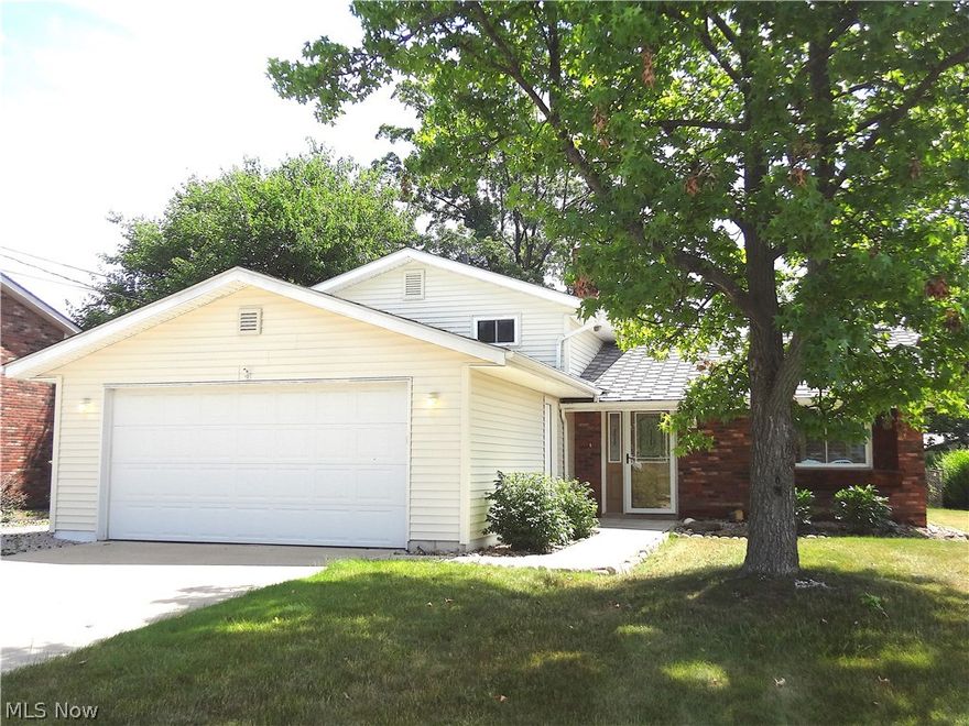 4-Level Split in Northfield with many updates! Starting with the Curb Appeal, you will be delighted! Vinyl Sided with Attached 2 Car Garage, Newer Paved Drive with extra area for additional parking leads to Park Liked fenced back yard lined with Privacy Bushes, Oversized Deck with Retractable Awning perfect for entertaining and Large Shed. This Yard is a pleasant surprise and not to be missed! All this and you haven’t even been inside yet! You enter into Vaulted Ceilings, Laminate Flooring, and a gorgeous Remodeled Kitchen with Corian Counter tops, Under mount Sink, Walls of Cabinets and Large Eating Area. Living Room features a Sun Tunnel and opens to the Dining Room which overlooks the Deck. Remodeled Bathrooms, Lower Level Family Room and 4th Bedroom Plus a True Basement with Stall Shower that has been waterproofed and Great for storage! Newer Furnace, C/A, Sump Pump, Windows, Sewer line, and Cement. Much more !