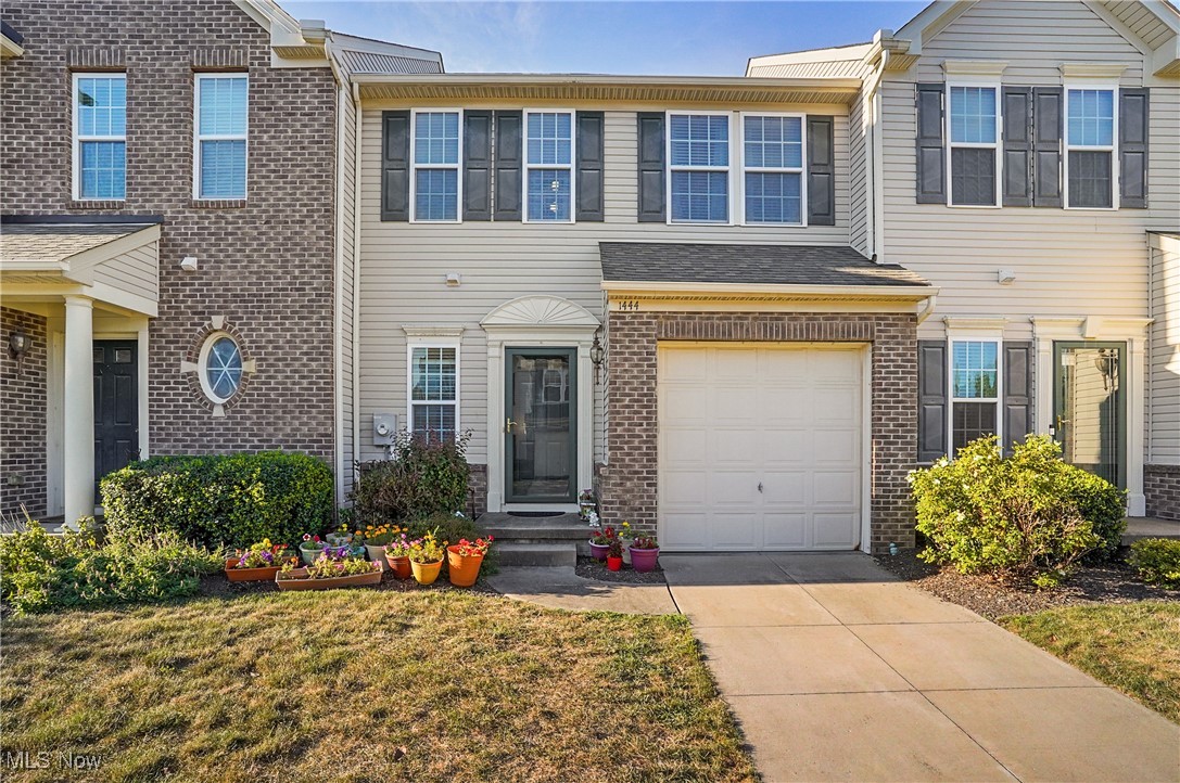 Welcome to 1444 Wellingshire Cir! This nicely updated and move-in ready townhome offers plenty of living space close to shopping and restaurants. Modern Laminate flooring greets you at the front Foyer. The open kitchen has granite counter tops and gorgeous cherry cabinets and newer stainless appliances that all remain. The spacious dining room offers room for entertaining. A half bath completes the first floor. Upstairs, the primary bedroom offers an en-suite full bath and a walk in closet with custom shelving. 2 additional bedrooms, a full bath and a laundry area complete the second floor. The finished Basement offers even more living space with a beautiful family room and an unfinished storage room. The freshly stained deck offers space for outdoor living and a view of the Pond. Furnace 2017, A/C 2024, oven and dishwasher 2024. Don't miss out on this terrific unit and schedule your showing today!