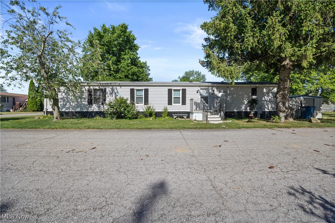 This charming 2-bedroom, 2-bathroom manufactured home is nestled in the desirable West Ridge Green Mobile Home community. Over the past two years, the home has undergone several thoughtful updates, including new laminate flooring, updated windows, refreshed kitchen cabinets, renovated bathrooms, and the addition of stylish new ceiling fans. Outside, the home features newly replaced metal skirting, a brand-new shed, and a partial roof replacement. The community offers a refreshing pool and a fun playground, making it a great place to live and relax.