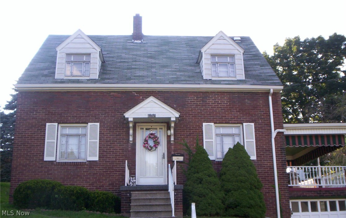 Marland Heights. Darling 2 bedroom brick cape cod home. Eat in kitchen, formal dining room, hardwood floors. Spacious living room with hardwood floors with door leading to a large covered porch to enjoy the view and summer days for your barbecue. Home is move in ready and immediate occupancy. Walking distance to Marland Heights Park.
