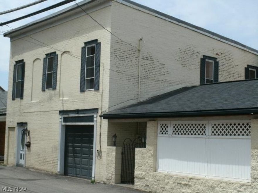 All kinds of good with this property!! 2 bedrooms with walk-in closets, garage with workshop, paved/fenced-in carport, patio. Over 1,700 sq. ft. of living space plus a large yard.