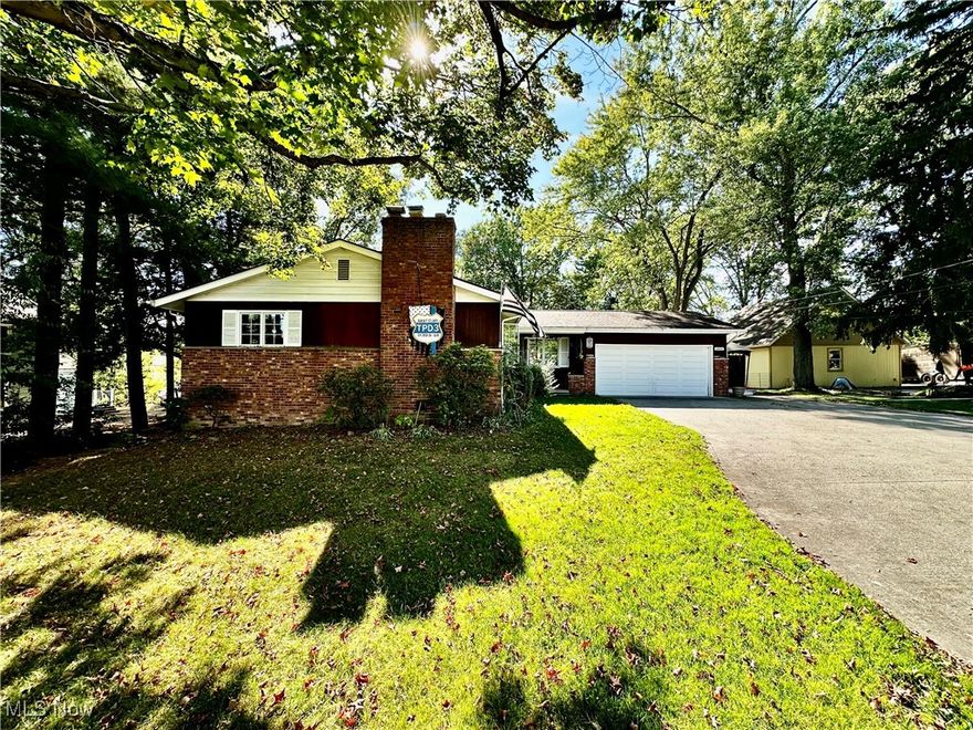 Welcome to this Twinsburg legacy ranch that has been with the family since it was built in 1968.  With 3 bedrooms, and 3 full baths, this lovely home features a finished walk-out basement.  A large living room has a fireplace and wood floors.  There is a large eat-in kitchen that also has a formal dining room.  The spacious bedrooms up all have hardwood floors.  The lower level consists of a large family room with a fireplace, a kitchenette/rec area, a huge laundry room, a 4th bedroom or office, and ample storage.  A private back yard has a deck and huge shed.  The attached 2 car garage has water and a drain.  Do not miss this wonderful opportunity.