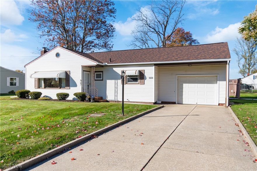 Welcome home to this charming and well-maintained ranch situated on a spacious, level half-acre lot in the desirable Manchester School District!! Brand new three dimensional roof 2025. New front gutters 2025. Nice curb appeal with neutral colored vinyl siding. Nice concrete driveway with attached garage. Back patio area with partial privacy fence. Double hung vinyl windows throughout. Spacious living room with converted gas log brick fireplace and lots of natural light. Hardwood floors under carpeting. Three bedrooms and one full bath. Basement provides excellent opportunity for additional finished square footage. Washer (2025) and dryer convey. Great location just off W. Nimilisa Rd and close to all that Portage Lakes has to offer and a short drive to Nimisila Reservoir! Make this ranch home yours today!!