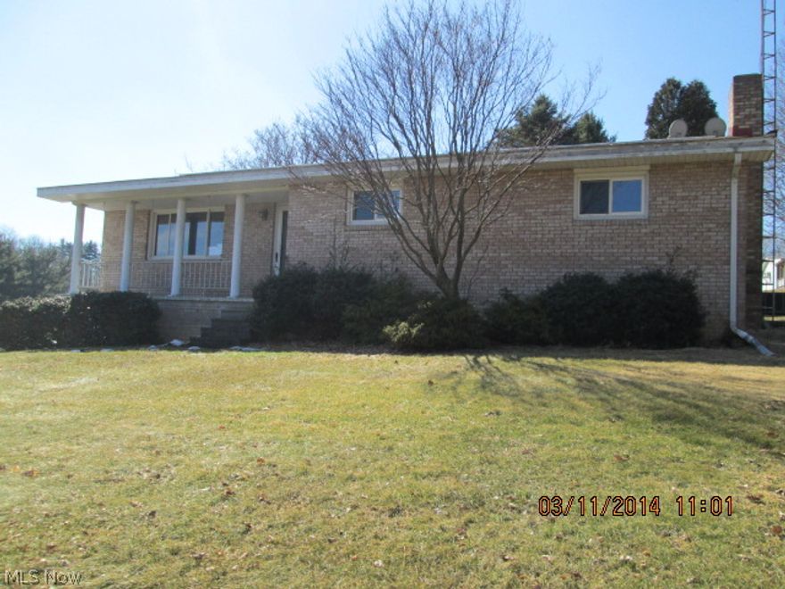 3 bedroom brick ranch on corner lot with partially finished basement.