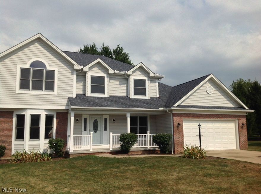 Absolute Beauty from pillar to post! Everything has been updated in this gorgeous 4 bedroom colonial in the desirable Stone Creek Development.  You'll feel at home the moment you step onto the porch & walk into the inviting two story foyer w/beautiful wood floors & second story shelves w/electric outlet, great for those holiday decorations!  The formal dining room has wood floors & tray ceiling.  The huge great room has a bay window, brick gas start fireplace w/ recessed lighting. The great room opens up to the eat-in kitchen which is updated with everything you are looking for: granite counter tops, laminate tile flooring, glass back-splash, 54 in. island, aristocraft cabinets, pantry, stainless steel appliances & new patio door with blinds inside that leads you out to the freshly stained deck & 14 x 10 shed with new vinyl siding & doors. The enormous master has double tray ceiling, wall of windows, & glamour bath, complete with granite counters, double sinks, jetted tub, shower, & wa