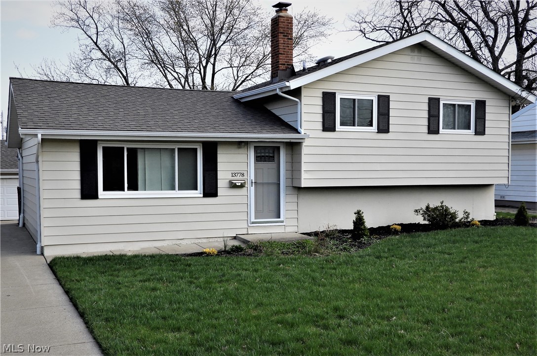 Beautiful updated split * high effient furnace/AC, roof, windows, doors, floors all just a few years old * remodeled granite kitchen with S/S appliances * remodeled upstairs bathroom * gorgeous hardwood floors * lower level lav and shower * lots of storage * 2 car garage * fenced yard * NICE!
